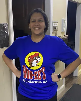 Ivone wearing a blue Buc-ee's Brunswick Georgia T-shirt