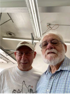 Dr. Jim and a fellow attendee at the car celebration