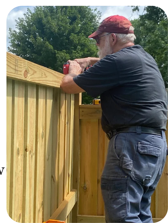 Dr. Jim completing the new fence